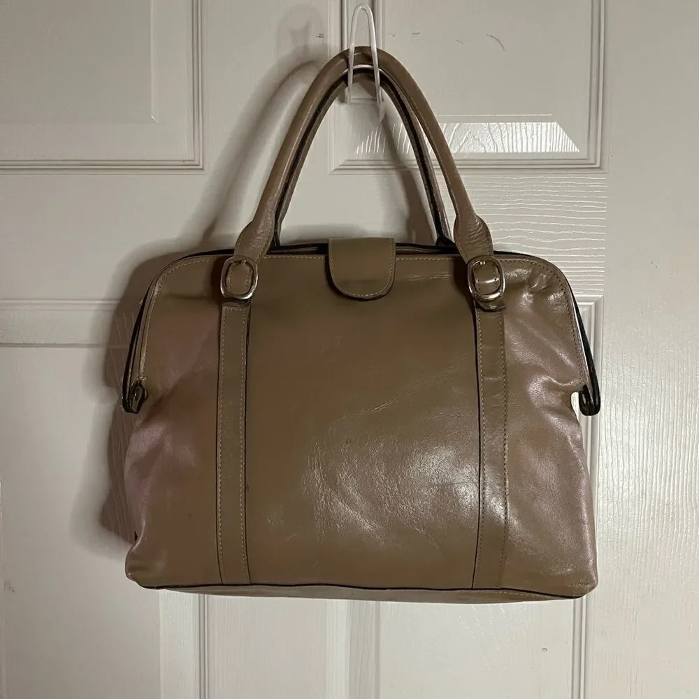 Tano Leather tan frame medium satchel gold tone hardwares .